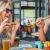 women eating pizza at a restaurant